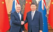 习近平会见新西兰总理拉克森