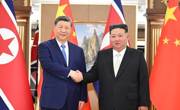 习近平同金正恩举行会谈