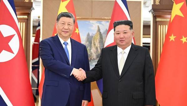 习近平同金正恩举行会谈